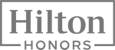 The image shows the Hilton Honors logo, a loyalty program's branding.